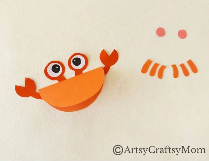 Here's a cute little crab papercraft for kids to try when they need something to stay busy! All you need is colored craft paper and basic supplies!
