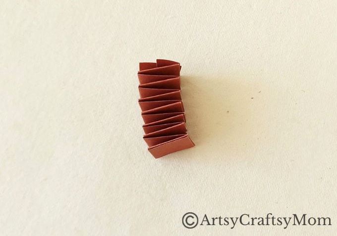 Here's a cute little paper cup robot craft for kids to make and play with! A fun craft that shows children how to upcycle ordinary household items!