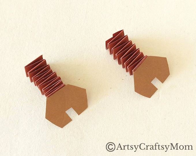Here's a cute little paper cup robot craft for kids to make and play with! A fun craft that shows children how to upcycle ordinary household items!