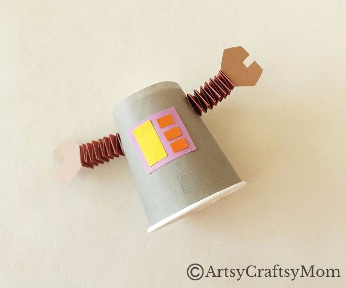 Here's a cute little paper cup robot craft for kids to make and play with! A fun craft that shows children how to upcycle ordinary household items!
