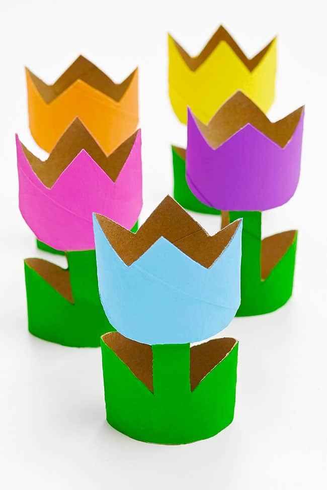 Celebrate National Tulip Day and spring blooms with these colorful tulip crafts for kids! Make tulips out of paper, cotton pads, even clothespins!