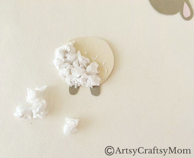 Crumpling paper is fun, & this crumpled paper sheep craft is a great way to use up all those crumpled bits! Easy fine motor exercise for young kids.
