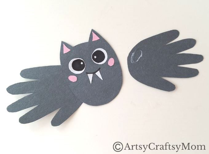 Easy Handprint Bat Paper Craft for Halloween 7 Here's a fun and easy Handprint Bat Paper Craft for kids to make this Halloween! With basic craft supplies and a pair of hands, you're all set!
