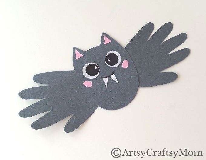 Easy Handprint Bat Paper Craft for Halloween 8 Here's a fun and easy Handprint Bat Paper Craft for kids to make this Halloween! With basic craft supplies and a pair of hands, you're all set!