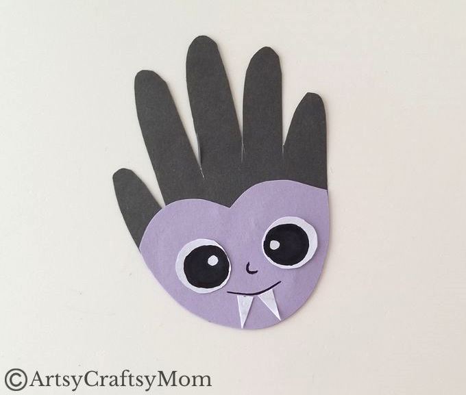 If you're looking for a Creative Handprint Dracula Craft for Halloween, we got you! This one features a dracula with handprint hair and a cute smile!