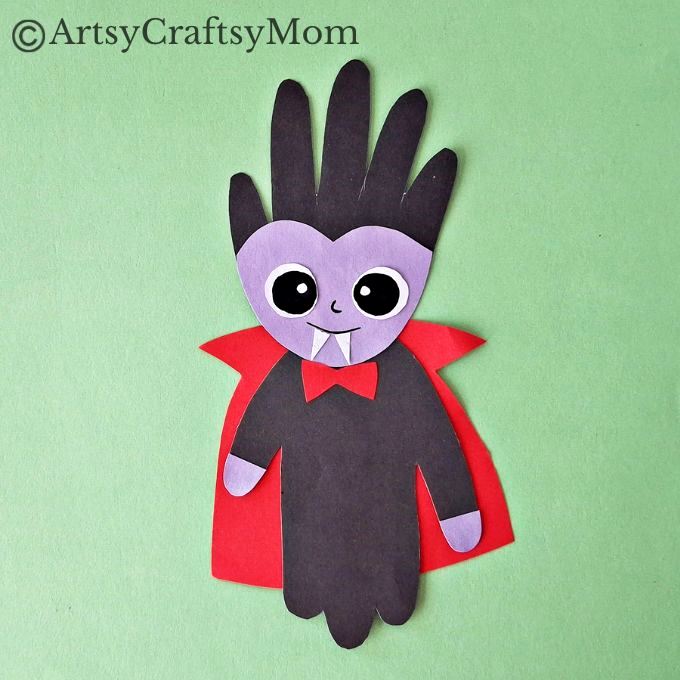 If you're looking for a Creative Handprint Dracula Craft for Halloween, we got you! This one features a dracula with handprint hair and a cute smile!