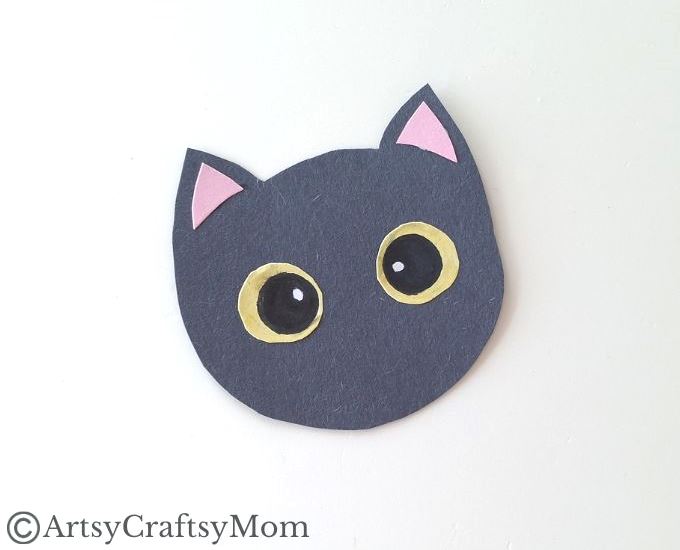 If you're looking for a black cat craft this Halloween, you'll love this cute handprint black cat craft, made entirely out of colored craft paper!
