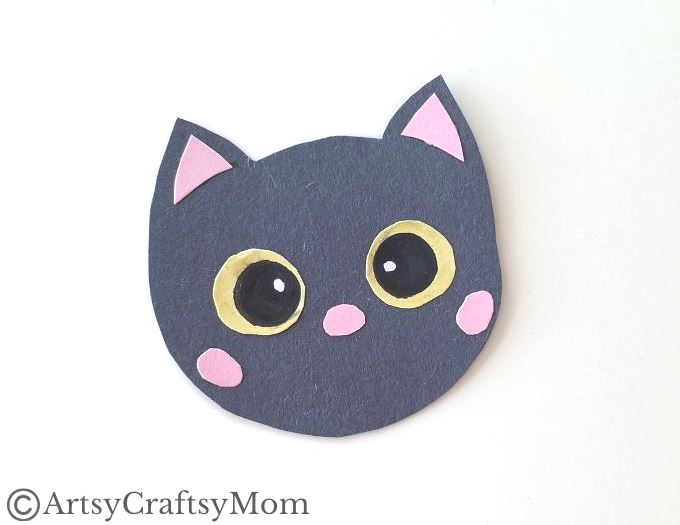 If you're looking for a black cat craft this Halloween, you'll love this cute handprint black cat craft, made entirely out of colored craft paper!