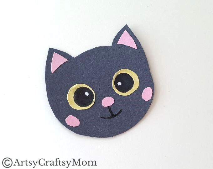 If you're looking for a black cat craft this Halloween, you'll love this cute handprint black cat craft, made entirely out of colored craft paper!
