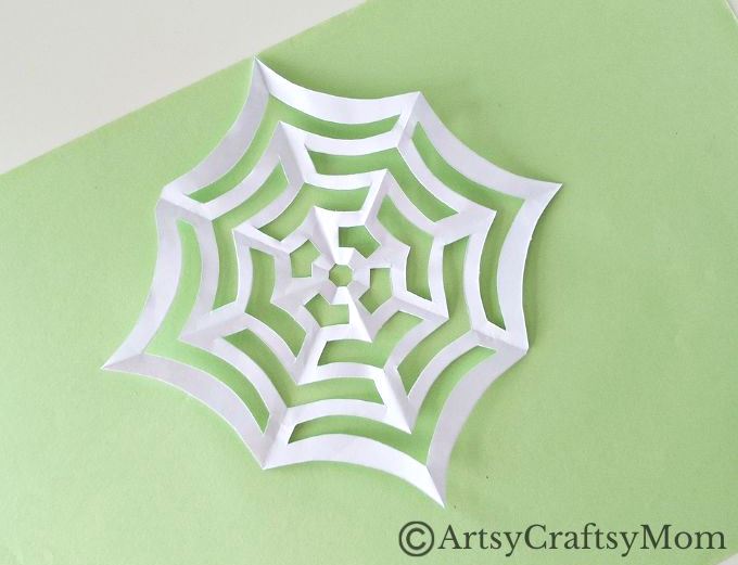Put your hands together for this fun handprint spider craft for kids! It comes with its own web, and makes for the perfect Halloween project!