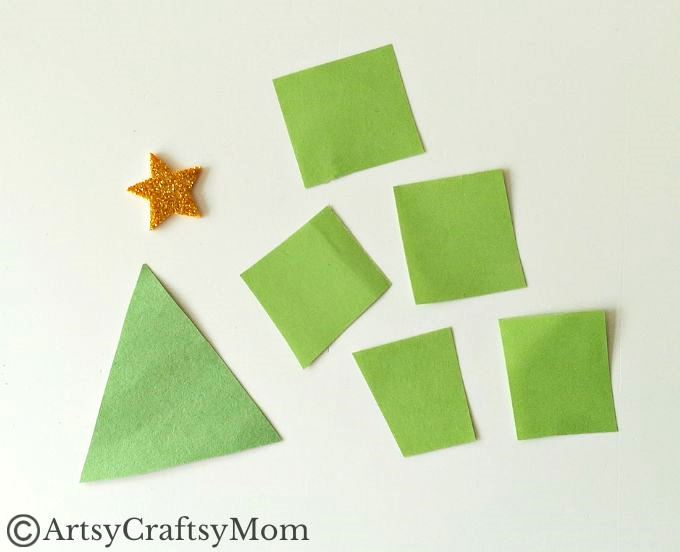 This crumpled paper Christmas tree ornament is the easiest Christmas craft for kids to try this holiday season - all you need is lots of green paper!