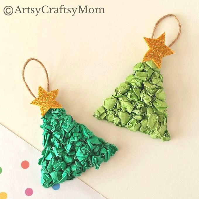 This crumpled paper Christmas tree ornament is the easiest Christmas craft for kids to try this holiday season - all you need is lots of green paper!