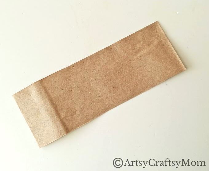 Can you turn a paper bag into a Christmas ornament? Well, this paper bag star ornament craft certainly proves it can be done without much effort!