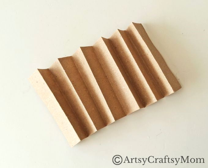 Can you turn a paper bag into a Christmas ornament? Well, this paper bag star ornament craft certainly proves it can be done without much effort!