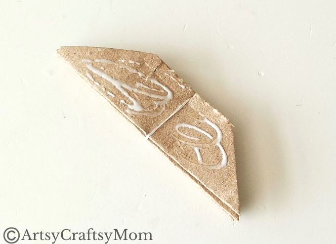 Can you turn a paper bag into a Christmas ornament? Well, this paper bag star ornament craft certainly proves it can be done without much effort!