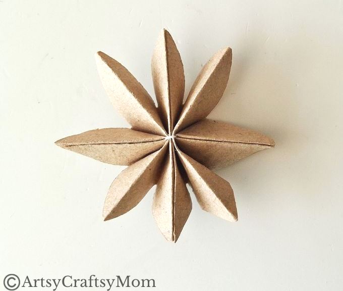 Can you turn a paper bag into a Christmas ornament? Well, this paper bag star ornament craft certainly proves it can be done without much effort!