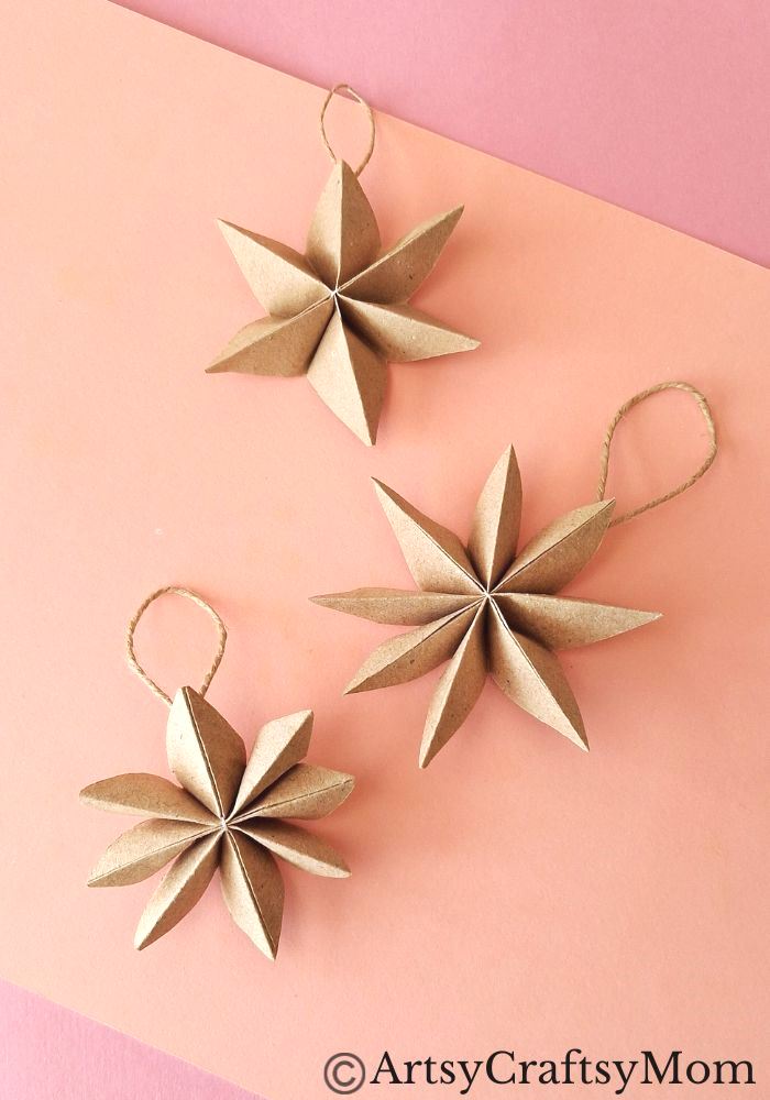 Can you turn a paper bag into a Christmas ornament? Well, this paper bag star ornament craft certainly proves it can be done without much effort!