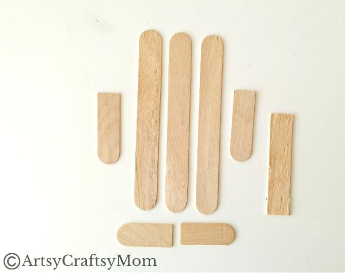 Kids will love creating this popsicle stick Nutcracker craft out of craft sticks and paints! Add some string and use it to decorate your tree!