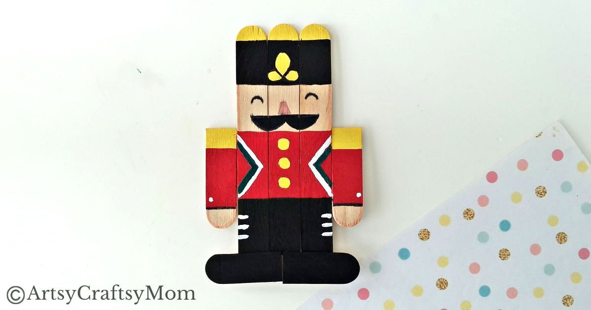 Kids will love creating this popsicle stick Nutcracker craft out of craft sticks and paints! Add some string and use it to decorate your tree!