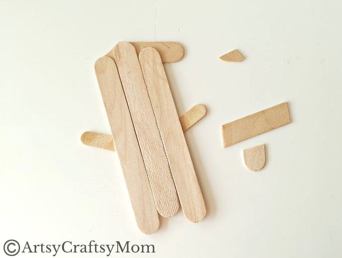 Who says a snowman has to be round? This Popsicle Stick Snowman Craft proves that you can have a snowman in any shape you like!