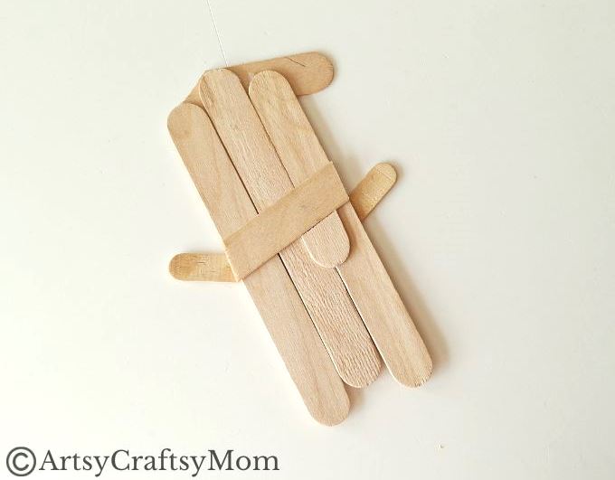 Who says a snowman has to be round? This Popsicle Stick Snowman Craft proves that you can have a snowman in any shape you like!