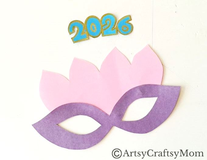 This Printable New Year Mask Craft is the perfect accessory to carry to this year's New Year's Eve bash! Prepare for lots of compliments!