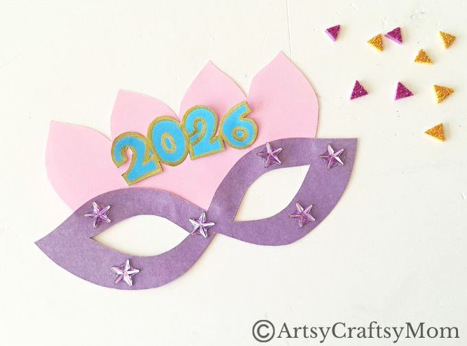 This Printable New Year Mask Craft is the perfect accessory to carry to this year's New Year's Eve bash! Prepare for lots of compliments!