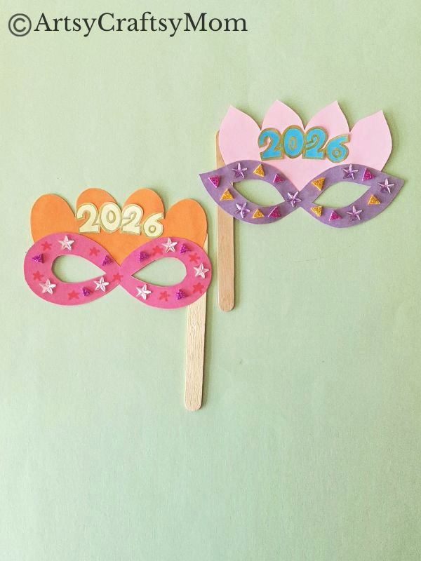 This Printable New Year Mask Craft is the perfect accessory to carry to this year's New Year's Eve bash! Prepare for lots of compliments!