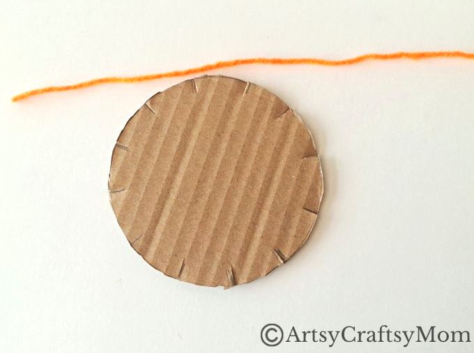 Here's a beautiful yarn-wrapped snail craft for kids to help exercise their fine motor skills and also help them focus intently on a task for a while!