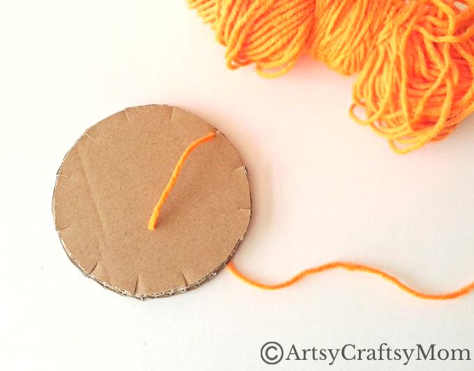 Here's a beautiful yarn-wrapped snail craft for kids to help exercise their fine motor skills and also help them focus intently on a task for a while!