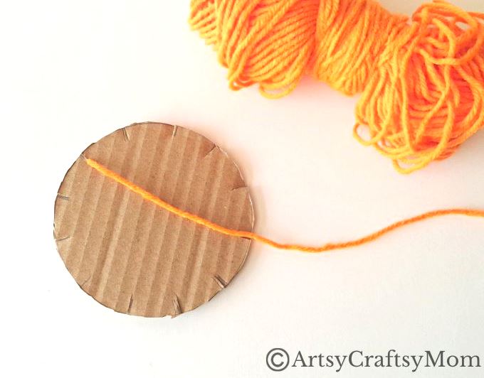Here's a beautiful yarn-wrapped snail craft for kids to help exercise their fine motor skills and also help them focus intently on a task for a while!