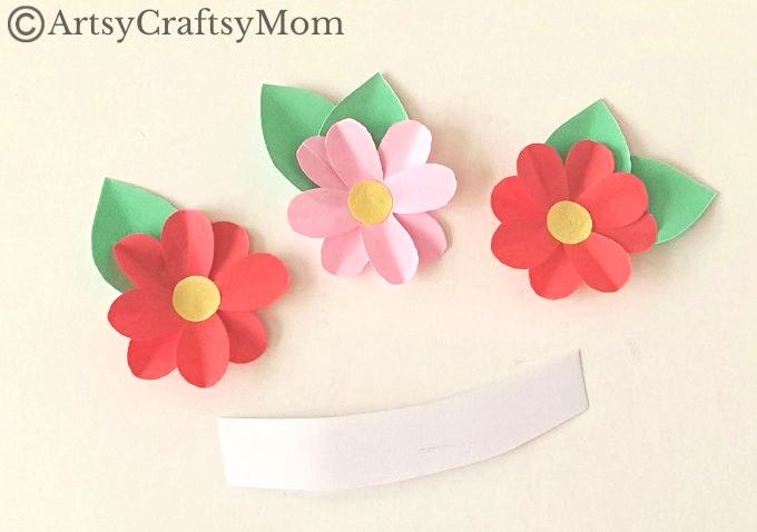 Let's welcome spring with a pretty paper bag spring fairy puppet craft! This fairy reminds us of flowers, greenery & everything we love about spring!