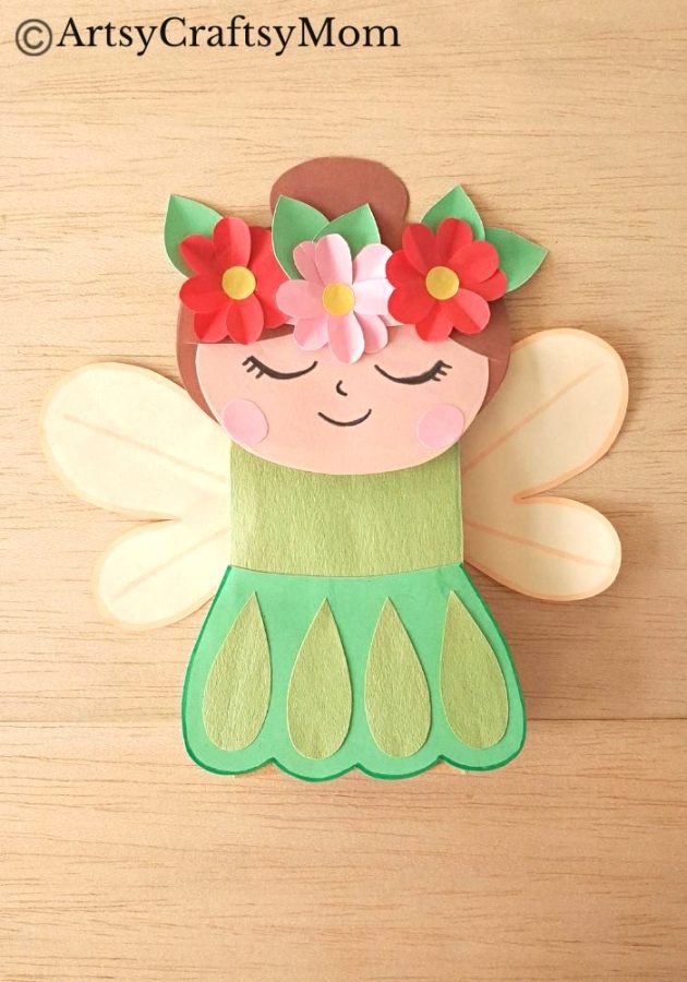 Let's welcome spring with a pretty paper bag spring fairy puppet craft! This fairy reminds us of flowers, greenery & everything we love about spring!
