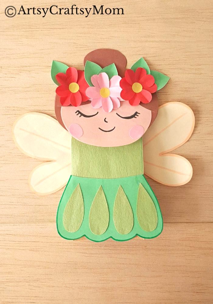 Let's welcome spring with a pretty paper bag spring fairy puppet craft! This fairy reminds us of flowers, greenery & everything we love about spring!