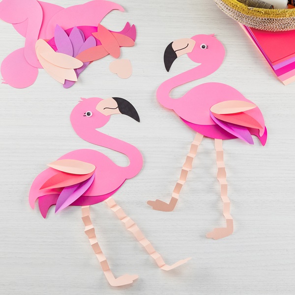 Love flamingos? Then you'll love these fancy Flamingo Crafts for Kids! Enjoy the explosion of pink with flamingos made from paper, felt, pom poms and more!