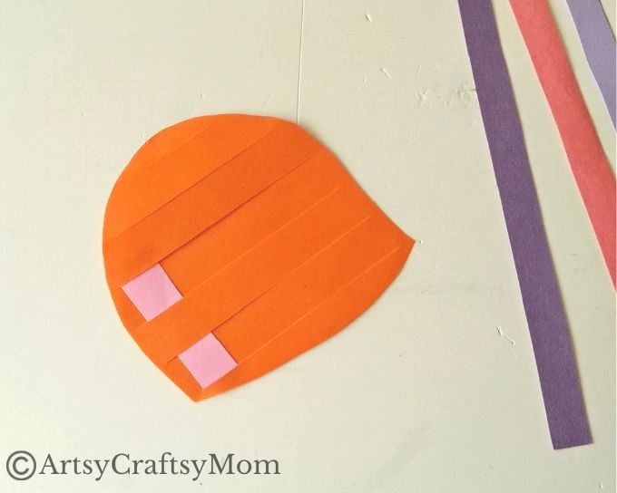 Here's a fun Woven Paper Snail Craft for Kids to help us learn more about the amazing features of the snail shell, while improving motor skills!