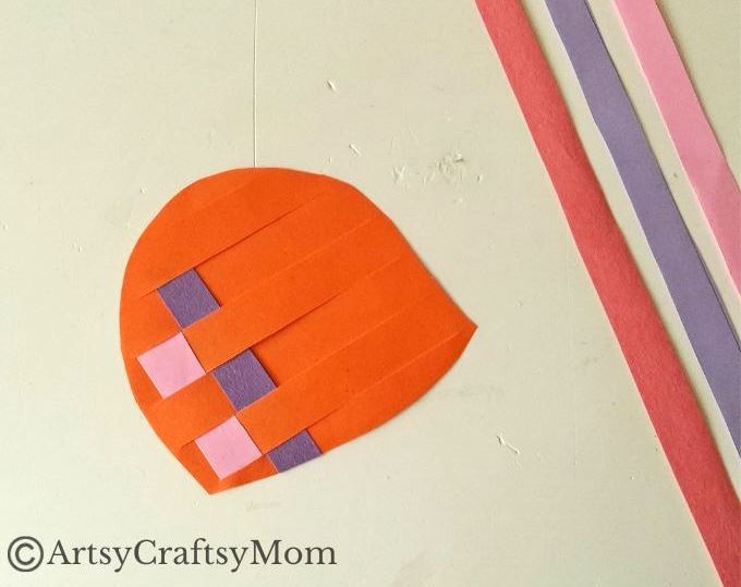 Here's a fun Woven Paper Snail Craft for Kids to help us learn more about the amazing features of the snail shell, while improving motor skills!