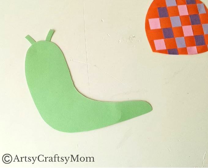 Here's a fun Woven Paper Snail Craft for Kids to help us learn more about the amazing features of the snail shell, while improving motor skills!