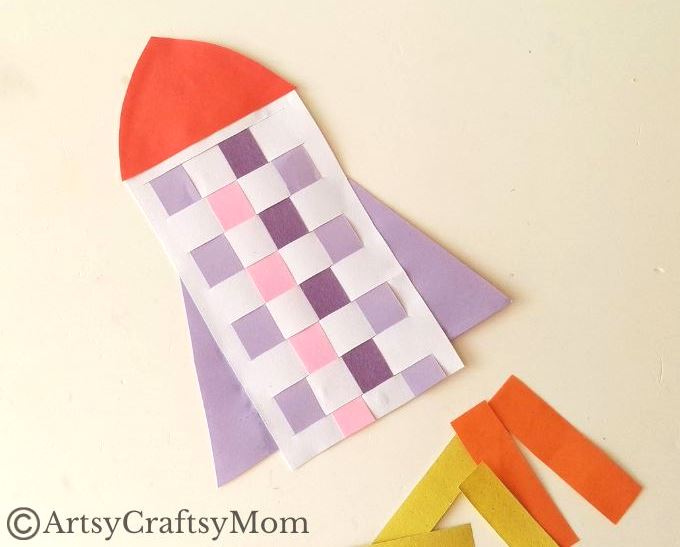 New to paper weaving? This colorful woven paper rocket craft is the perfect choice for little kids starting out, without overwhelming them!