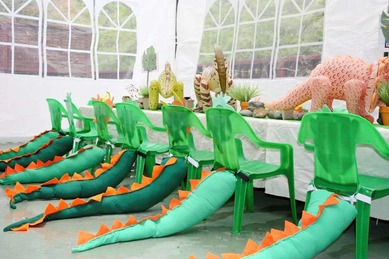 Planning a dinosaur-themed party for kids? Take a look at the coolest ideas for decorations, printables, games, party foods, cakes and more!
