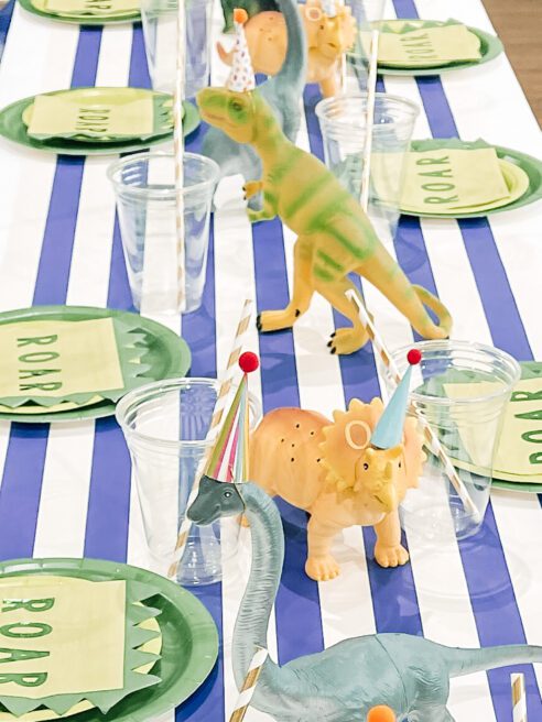 Planning a dinosaur-themed party for kids? Take a look at the coolest ideas for decorations, printables, games, party foods, cakes and more!