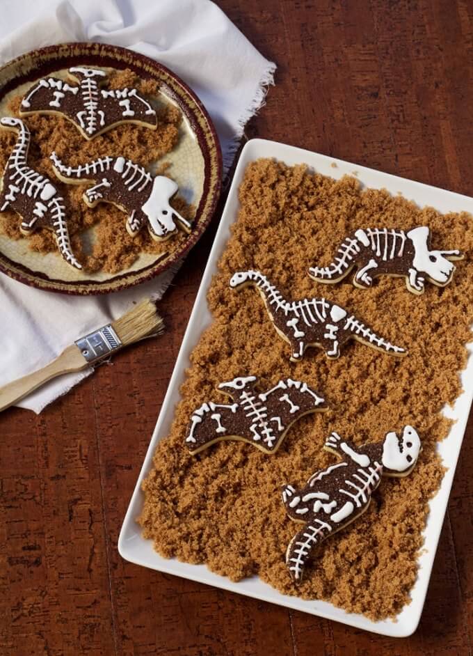 Planning a dinosaur-themed party for kids? Take a look at the coolest ideas for decorations, printables, games, party foods, cakes and more!