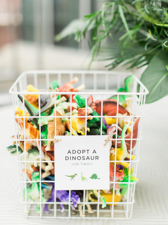 Planning a dinosaur-themed party for kids? Take a look at the coolest ideas for decorations, printables, games, party foods, cakes and more!