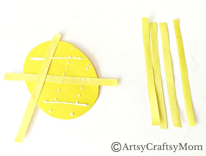 This juicy handprint pineapple craft for kids is perfect for the summer and looks good enough to eat! Ideal project for young kids and preschoolers!