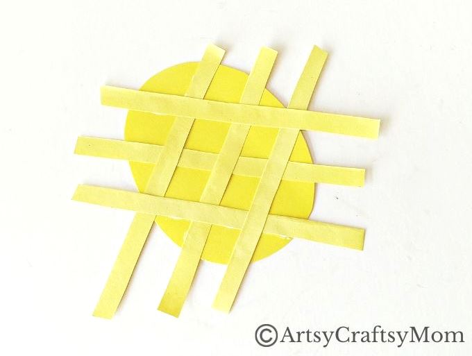This juicy handprint pineapple craft for kids is perfect for the summer and looks good enough to eat! Ideal project for young kids and preschoolers!