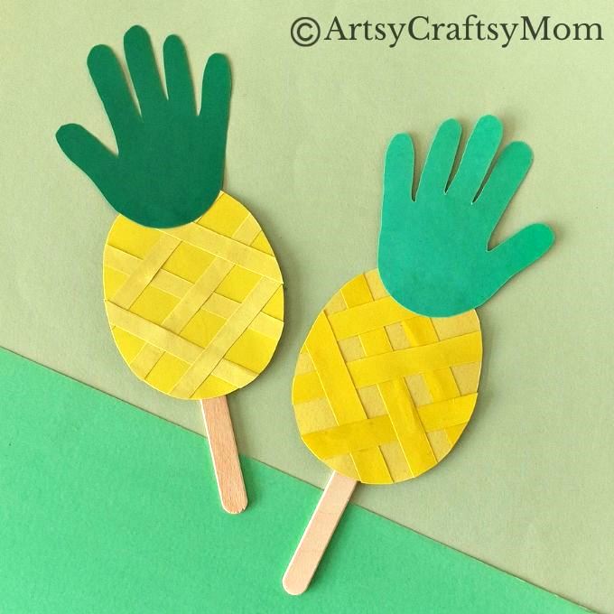 This juicy handprint pineapple craft for kids is perfect for the summer and looks good enough to eat! Ideal project for young kids and preschoolers!