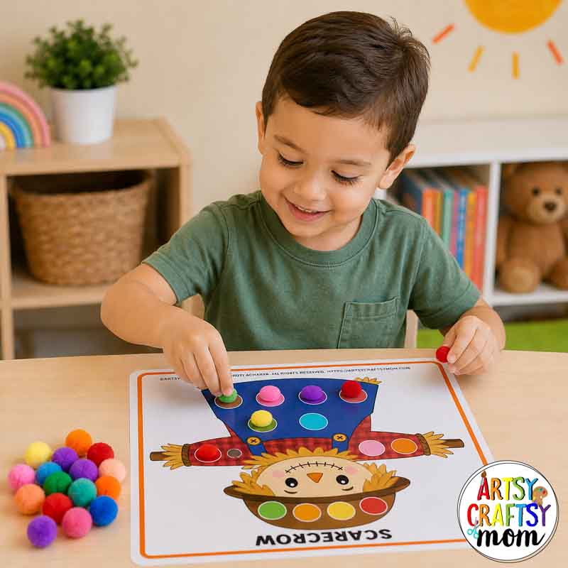 Printable Autumn Pom Pom Mats 3 Printable Autumn Pom Pom Mats featuring apple basket, squirrel, scarecrow, pumpkin, acorn, and leaf activity pages with colorful pom poms.