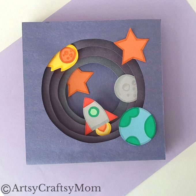 This Space-Themed Paper Art Project for Kids proves that you can make art with little more than colored craft paper and basic craft supplies!