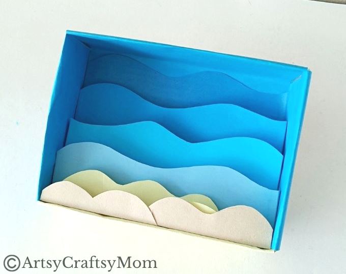 Celebrate the wonderful diversity of ocean life as you make this beautiful cardboard box underwater diorama, filled with colorful fish and plants!