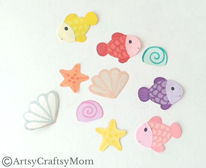 Celebrate the wonderful diversity of ocean life as you make this beautiful cardboard box underwater diorama, filled with colorful fish and plants!
